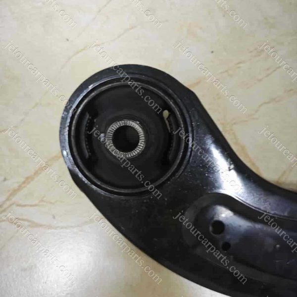 f18-2919310 rear trailing arm-left 1037